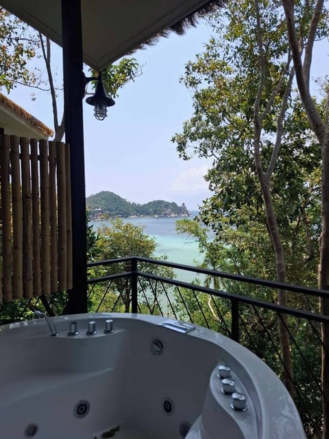 Deluxe Double Room, Partial Sea View | Outdoor spa tub