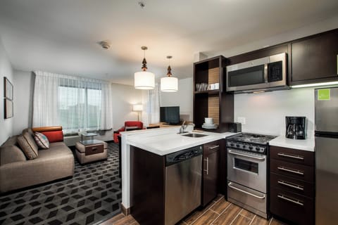 Suite, 2 Bedrooms | Private kitchen | Microwave, stovetop, dishwasher, coffee/tea maker