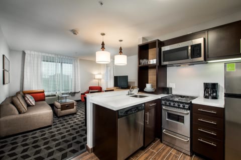 Suite, 2 Bedrooms | Private kitchen | Microwave, stovetop, dishwasher, coffee/tea maker