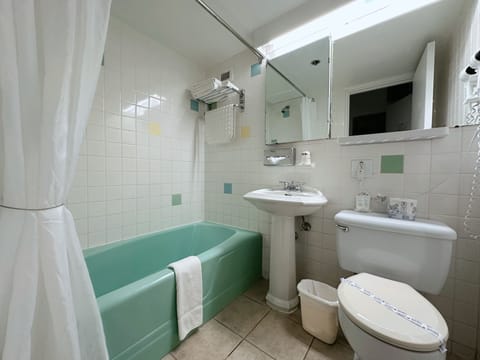 Room, 2 Double Beds | Bathroom | Free toiletries, hair dryer, towels