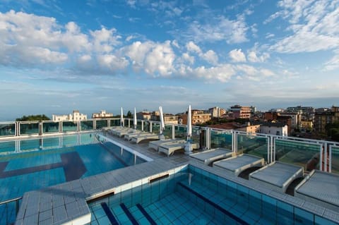 Seasonal outdoor pool, pool umbrellas, sun loungers