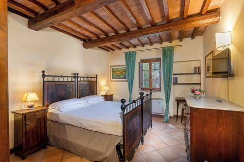 Apartment, 1 Bedroom | Minibar, desk, blackout drapes, iron/ironing board