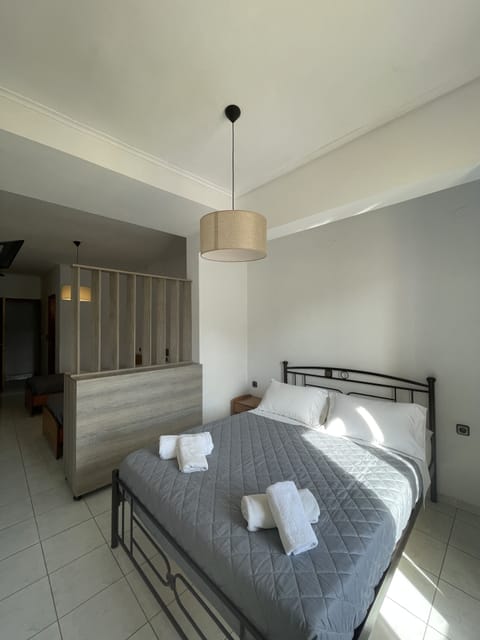 Quadruple Room, Sea View | Desk, soundproofing, free WiFi, bed sheets