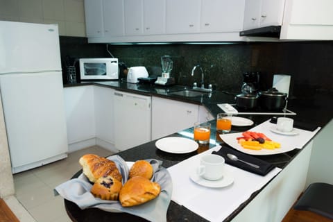 Suite, 1 Bedroom, Kitchen | Private kitchen | Full-size fridge, microwave, stovetop, dishwasher