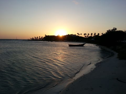 On the beach, white sand, beach towels