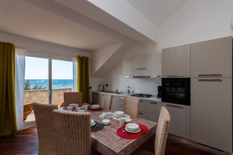 Apartment, 4 Bedrooms, Sea View | Private kitchen | Fridge, microwave, oven, stovetop