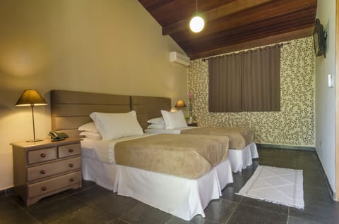 Standard Twin Room | Minibar, in-room safe, individually decorated, rollaway beds