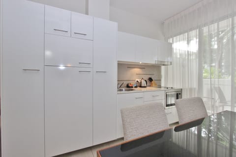 1 Bedroom Apartment | Private kitchen | Full-size fridge, microwave, stovetop, dishwasher