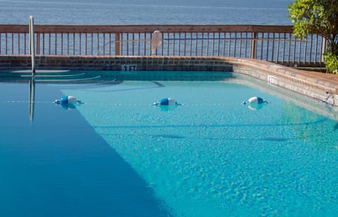Outdoor pool, open 8:00 AM to 7:00 PM, sun loungers
