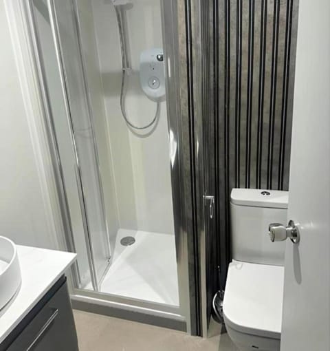 Standard Double Room, 1 Double Bed | Bathroom | Shower, free toiletries, towels, soap