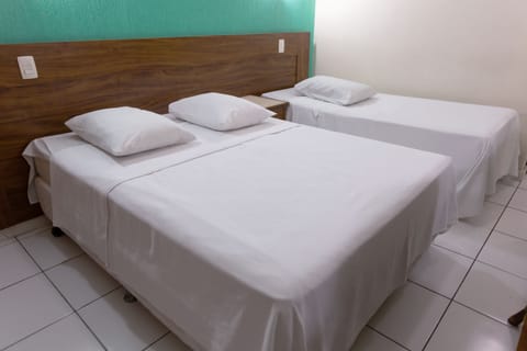 Deluxe Triple Room | Hypo-allergenic bedding, minibar, desk, free WiFi