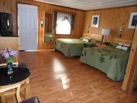 Brown cabins with Two Bed and Sofa Bed | Iron/ironing board, free cribs/infant beds, rollaway beds, free WiFi