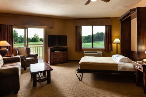 Executive Suite, 1 Bedroom | Living area | Flat-screen TV