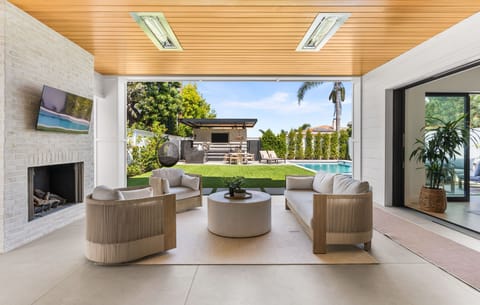 A covered outdoor lounge with open views.