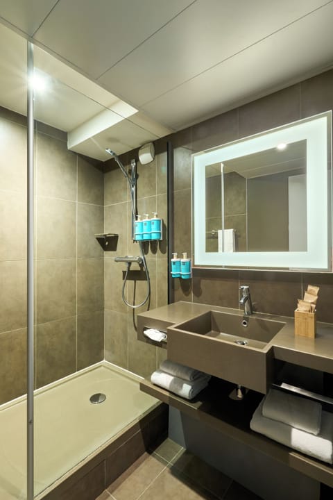 Eco-friendly toiletries, hair dryer, towels