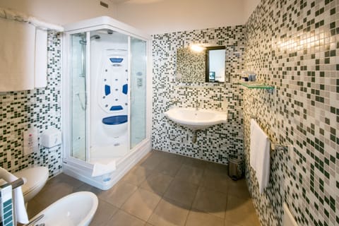 Suite | Bathroom | Designer toiletries, hair dryer, bidet, towels