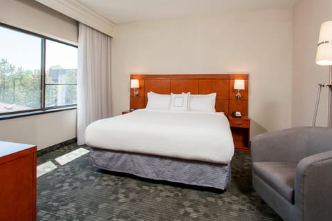 Suite, 1 Bedroom | Desk, blackout drapes, iron/ironing board, free cribs/infant beds