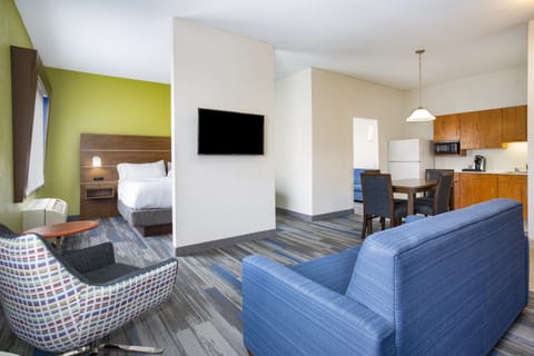 Suite, 1 King Bed (Additional Living Area) | In-room safe, desk, blackout drapes, iron/ironing board