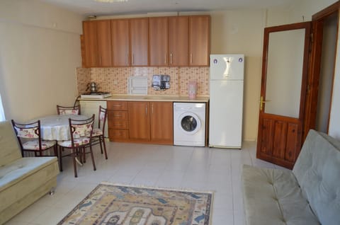 Apartment | Private kitchen | Full-size fridge, stovetop, coffee/tea maker, electric kettle