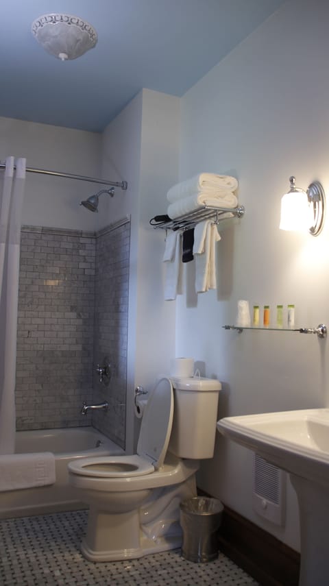 Deluxe Room, Private Bathroom | Bathroom | Combined shower/tub, designer toiletries, hair dryer, bathrobes