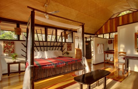 Deluxe Cabin, River View | Individually decorated, desk, cribs/infant beds, bed sheets