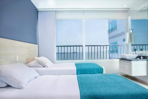 Standard Twin Room, Sea View | In-room safe, blackout drapes, free WiFi, bed sheets