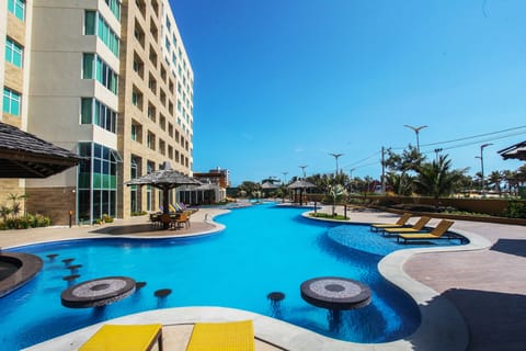 Outdoor pool, pool umbrellas, sun loungers