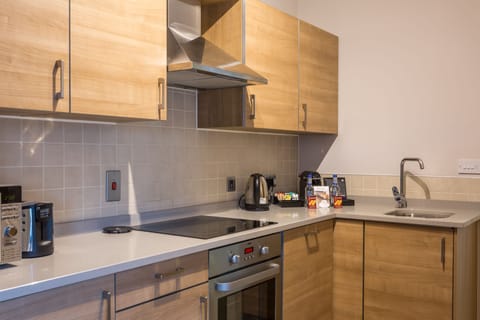 2 Bedroom Suite - Penthouse | Private kitchen | Full-size fridge, microwave, oven, stovetop