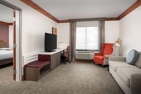 King 1 Bedroom Deluxe Suite | Living area | 43-inch TV with satellite channels