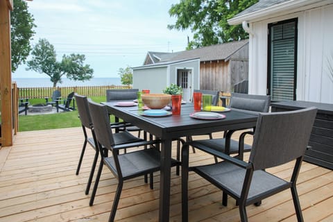 Large back patio, dining for 6, firepit, comfortable lounge area