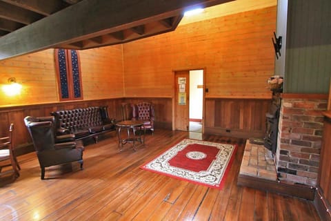 The Church Cottage | Living area | Flat-screen TV, fireplace