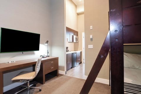 Family Suite, Kitchenette (1 King Bed, Bunk Beds) | In-room safe, blackout drapes, iron/ironing board, free WiFi