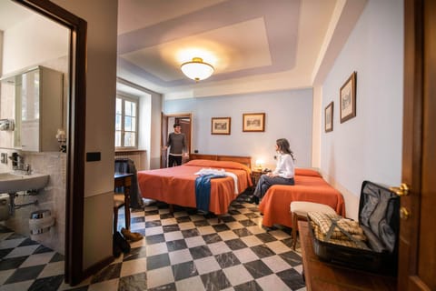 Comfort Triple Room, Garden View | Down comforters, memory foam beds, minibar, desk