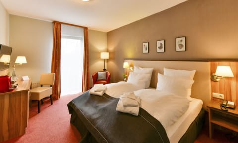 Desk, free WiFi, bed sheets