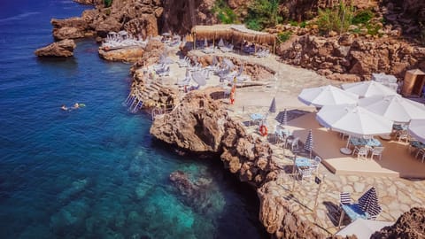 On the beach, sun loungers, beach umbrellas, beach towels