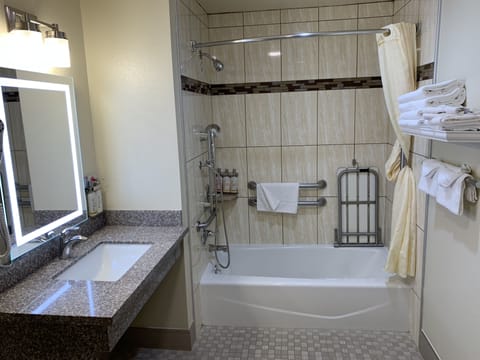 Deluxe Room, 2 Queen Beds, Accessible | Bathroom | Combined shower/tub, hair dryer, towels