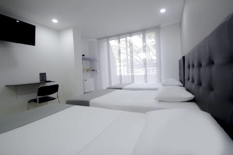 Superior Triple Room, Balcony | Minibar, in-room safe, free WiFi