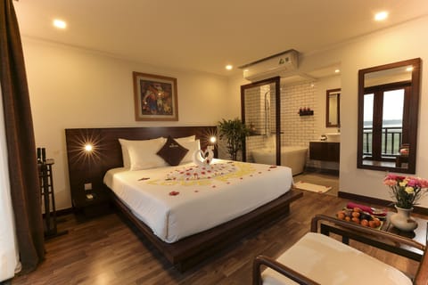 Honeymoon Suite, Balcony, River View | Premium bedding, down comforters, minibar, in-room safe