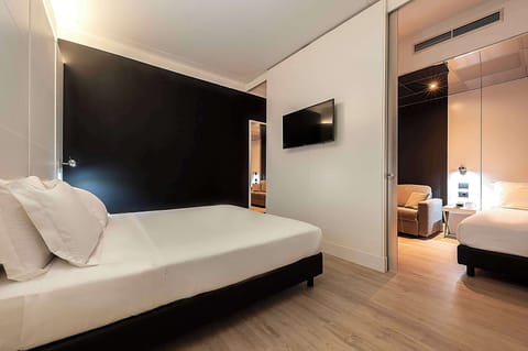 Superior Quadruple Room | Down comforters, minibar, in-room safe, desk