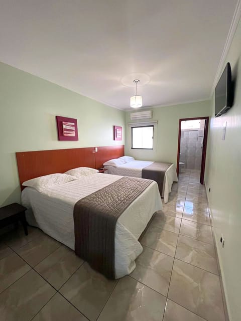 Deluxe Double or Twin Room, Multiple Beds | Minibar, desk, free WiFi, bed sheets