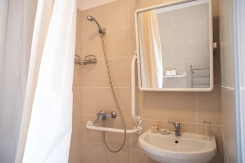 Triple Room, Partial Sea View | Bathroom | Free toiletries, hair dryer, towels