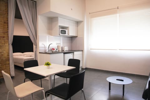 Apartment, 1 Bedroom | Private kitchen | Fridge, microwave, stovetop, coffee/tea maker