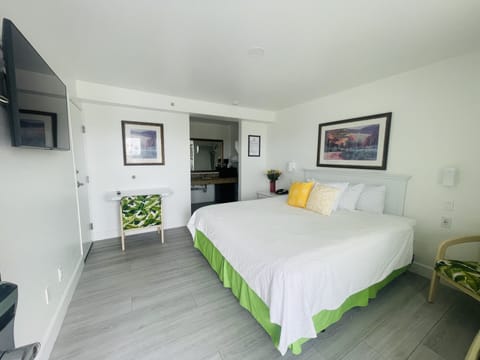 Comfort Room | Premium bedding, desk, laptop workspace, iron/ironing board