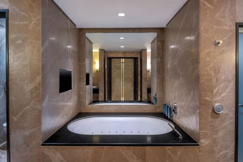 Presidential Suite, 1 King Bed | Bathroom | Separate tub and shower, rainfall showerhead, free toiletries