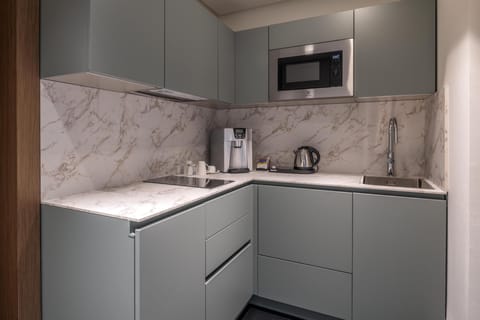 Presidential Suite, 1 King Bed | Private kitchen | Electric kettle