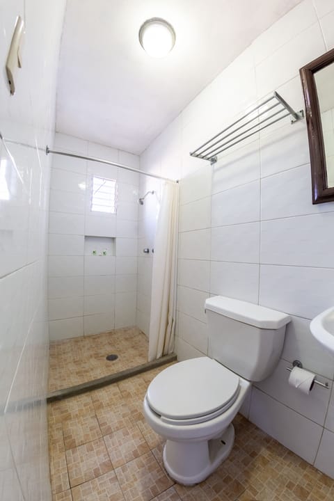 Standard Double Room, 2 Double Beds | Bathroom | Shower, free toiletries, hair dryer, towels