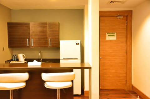 Superior Suite | Private kitchenette | Full-size fridge, microwave, coffee/tea maker, electric kettle