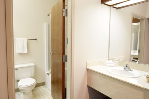 Deluxe Room, 2 Queen Beds | Bathroom | Combined shower/tub, hair dryer, towels