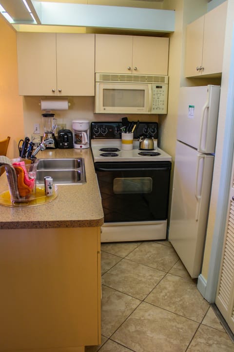 Apartment, 1 Bedroom (East) | Private kitchen | Full-size fridge, microwave, stovetop, dishwasher