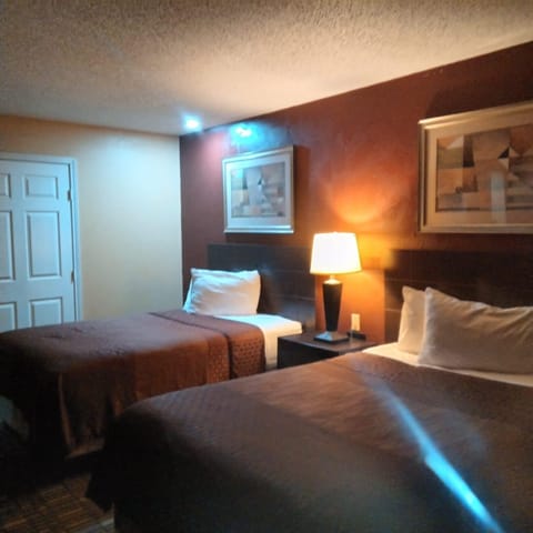 Standard Double Room, 2 Double Beds, Pool View | Desk, laptop workspace, blackout drapes, free WiFi